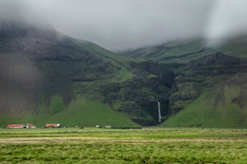 Along the road, every waterfall has a ranch at its base.